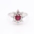 Bague rosette en or avec rubis et diamants d'occasion