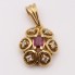 Pendentif  rosette en or avec rubis et diamants d'occasion