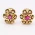 Boucles d'oreilles rosette en or avec rubis et diamants d'occasion