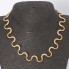 Collier zig zag en or lisse et texturé d'occasion