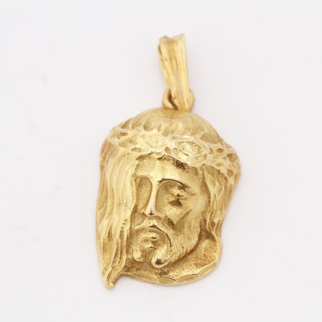 Pendentif visage du Christ en or...