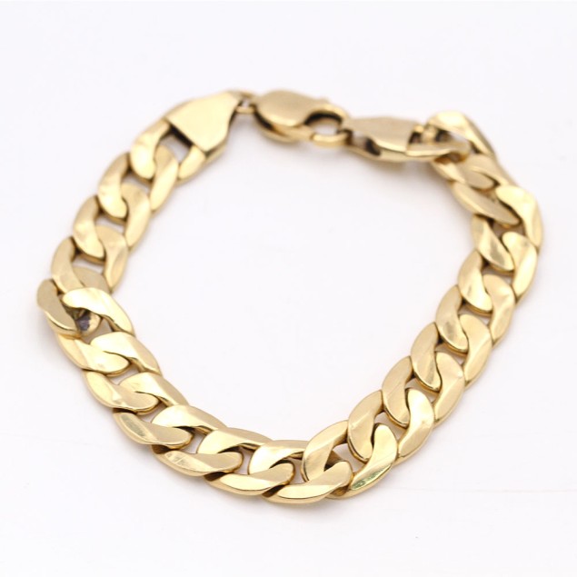 Bracelet barbu semi creux en or...