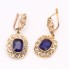 Boucles d'oreilles en or de style vintage avec zircon cubique et saphirs