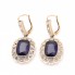 Boucles d'oreilles en or de style vintage avec saphirs et zircon cubique