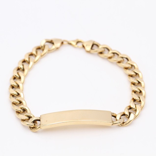 Bracelet gourmette semi creux en or...