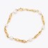 Bracelet d'occasion en or avec des perles