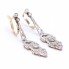 Boucles d'oreilles Art Déco en Platine et Diamants. D'occasion