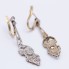 Boucles d'oreilles Art Déco en Platine et Diamants. D'occasion