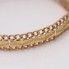 Bracelet articulé en or 18k d'occasion