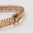 Bracelet articulé en or 18k d'occasion