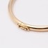 Bracelet d'occasion en or rigide uni