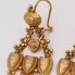 Boucles d'oreilles d'occasion en or 18k de style folklorique