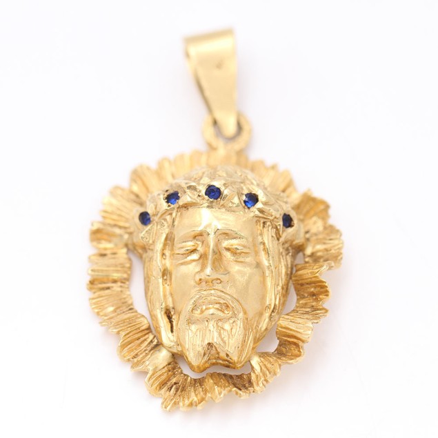 Pendentif Christ en or 18k d'occasion...