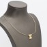 Collier double C entrelacé en or 18k d'occasion