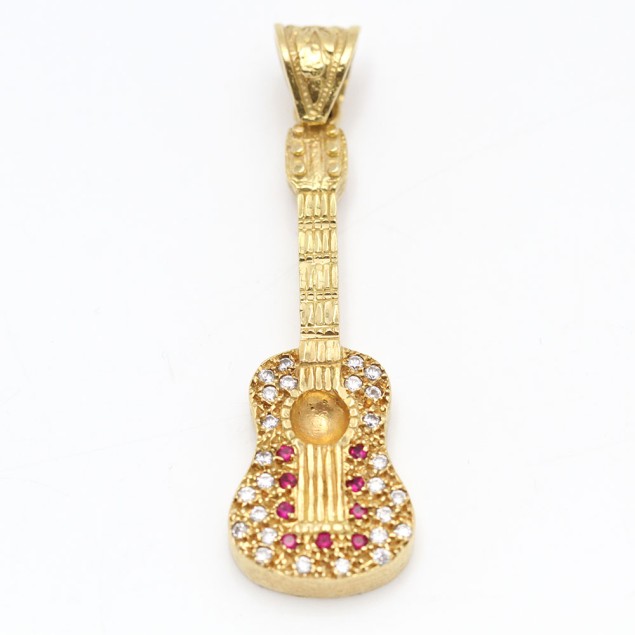 Pendentif guitare en or 18k...