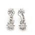 Boucles d'oreilles étoile en or 18k avec diamants seconde main