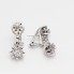 Boucles d'oreilles étoile en or 18k avec diamants seconde main