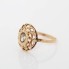 Bague rosette d'occasion en or 18k avec zircon