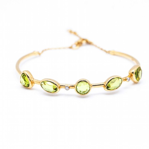 Pulsera de Oro, Diamantes y Peridoto....