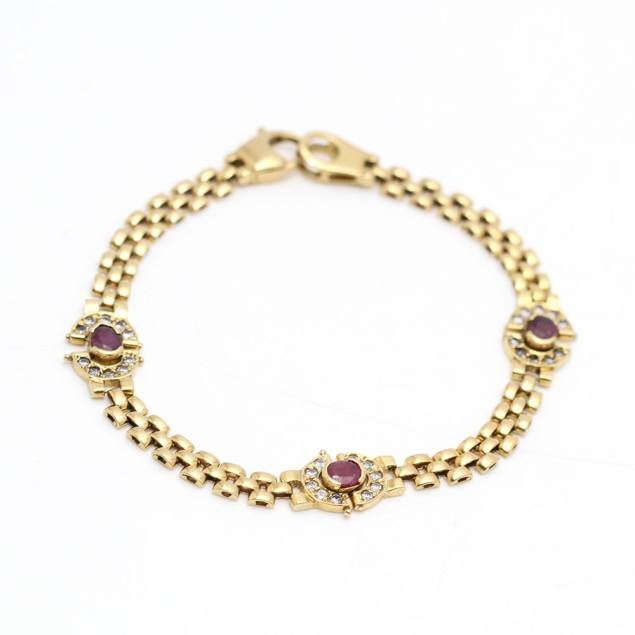 Bracelet en or 18k avec rubis et...