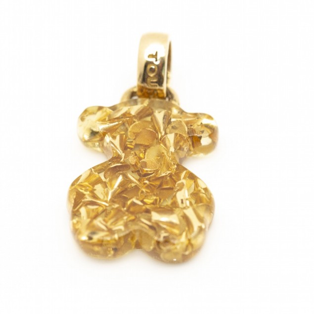 Pendentif TOUS avec des copeaux d'or....