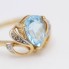 Anillo de oro 18k con topacio azul y diamantes segunda mano