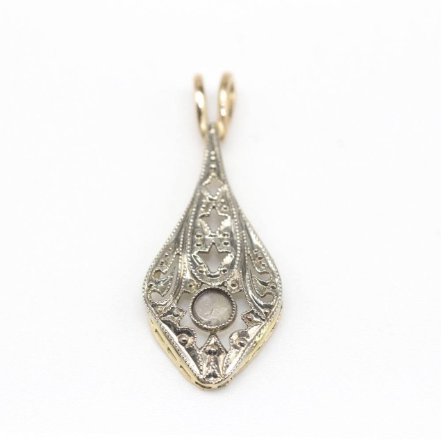 Pendentif vintage en or et platine....