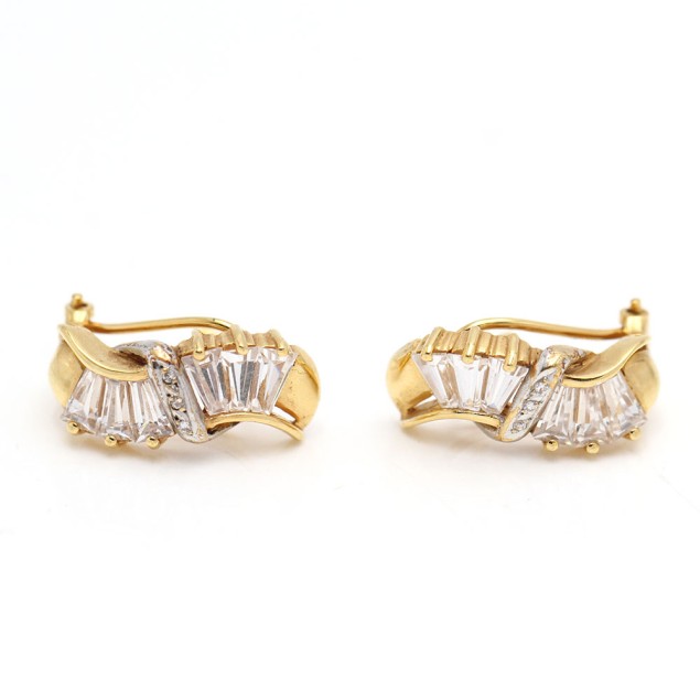 Pendientes ondas de oro 18k con...