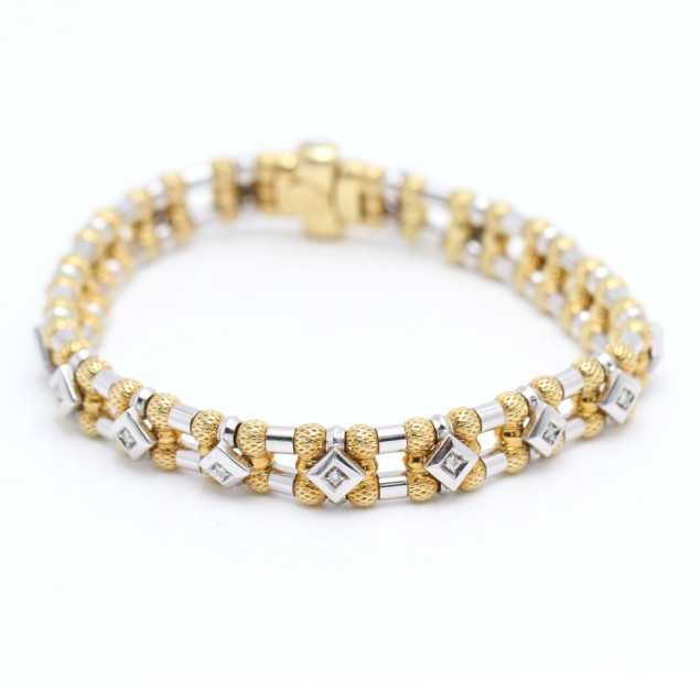 Polsera d'or bicolor 18k amb diamants...