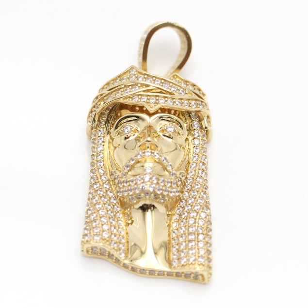 Pendentif Christ en or 18k d'occasion...