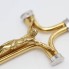 Pendentif croix et Christ en or bicolore 18k d'occasion