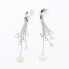 Boucles d'oreilles longues en or blanc 18k et nacre d'occasion