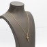 Cordon fin d'occasion avec pendentif croix en or 18k