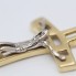 Pendentif croix en or bicolore 18k d'occasion