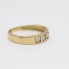 Bague triple en or 18k d'occasion avec zirconias