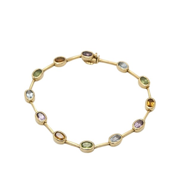 Pulsera de oro 18k con piedras...