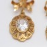 Boucles d'oreilles longues d'occasion en or 18k avec zirconias