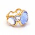 Bague BLUE SKY en or avec diamants et topaze.